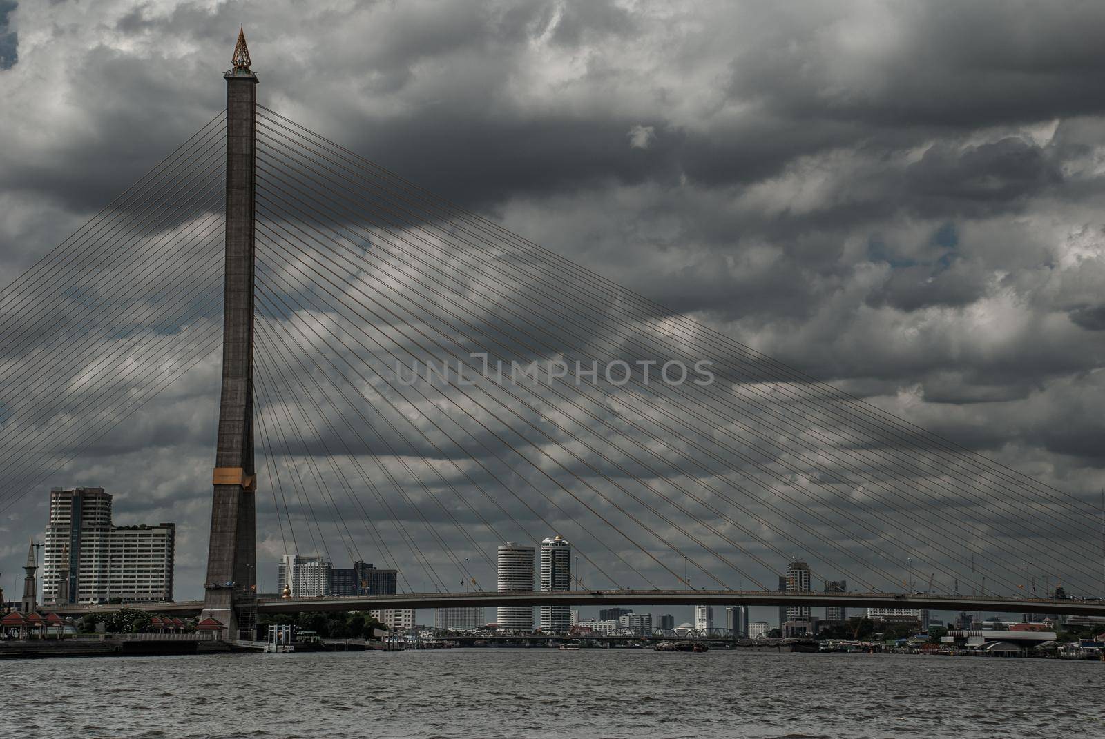 Bangkok, thailand 21 Jul, 2019 : Rama Rama VIII bridge, Rope Bridge across the Chao Phraya River of view blue sky is background and Cityscape of Bangkok.