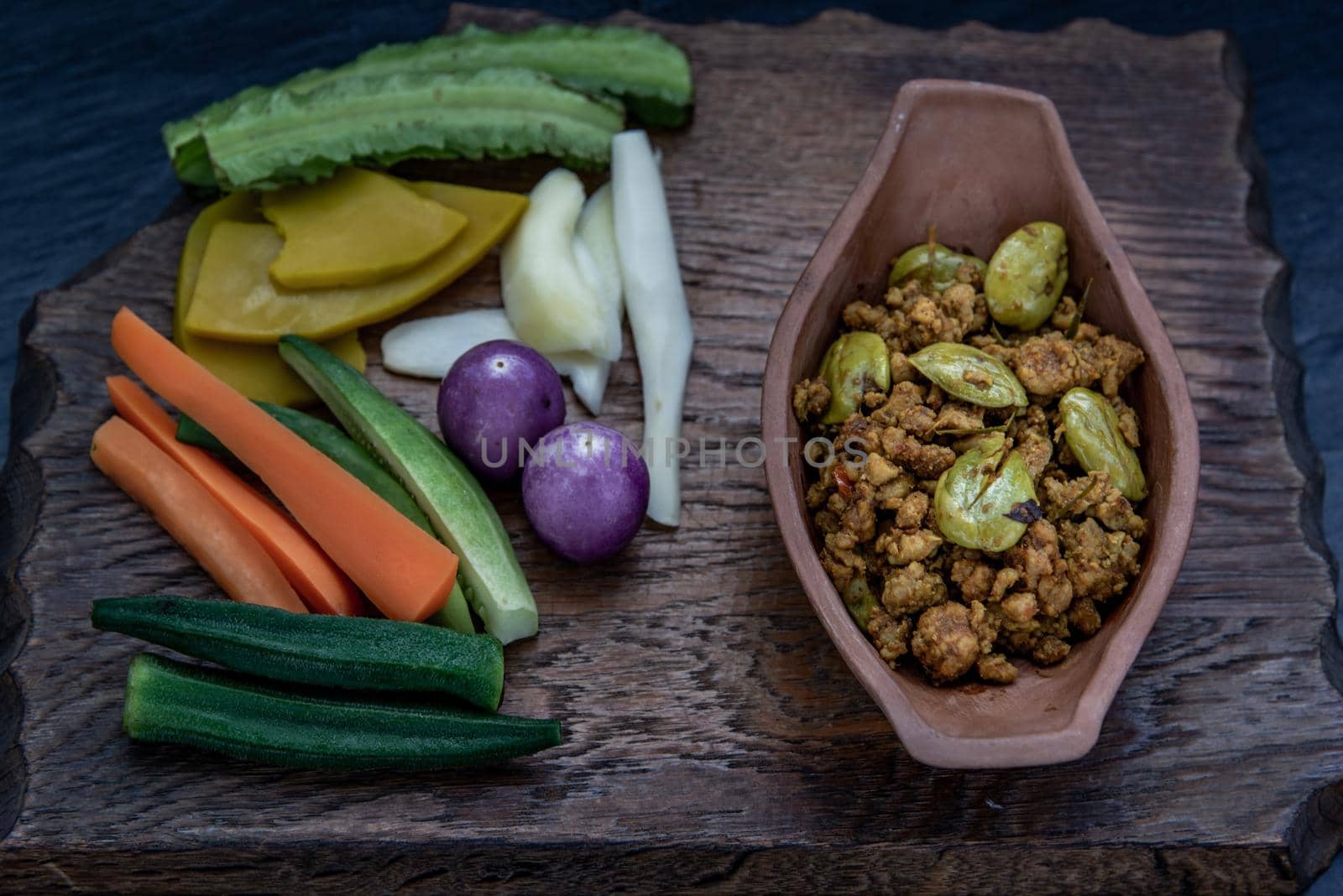 Thai food,  Southern Thai dry curry with ground pork Khua Kling, Thai dry curry with ground pork with Herbs vegetables, Oblique view from the top.