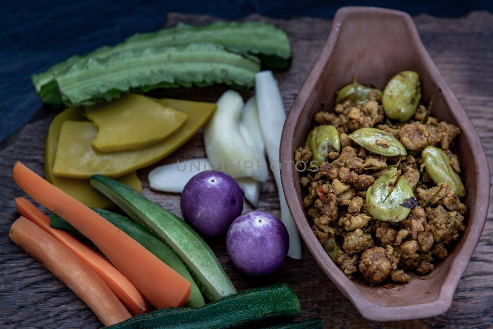 Thai food,  Southern Thai dry curry with ground pork Khua Kling, Thai dry curry with ground pork with Herbs vegetables, Oblique view from the top.