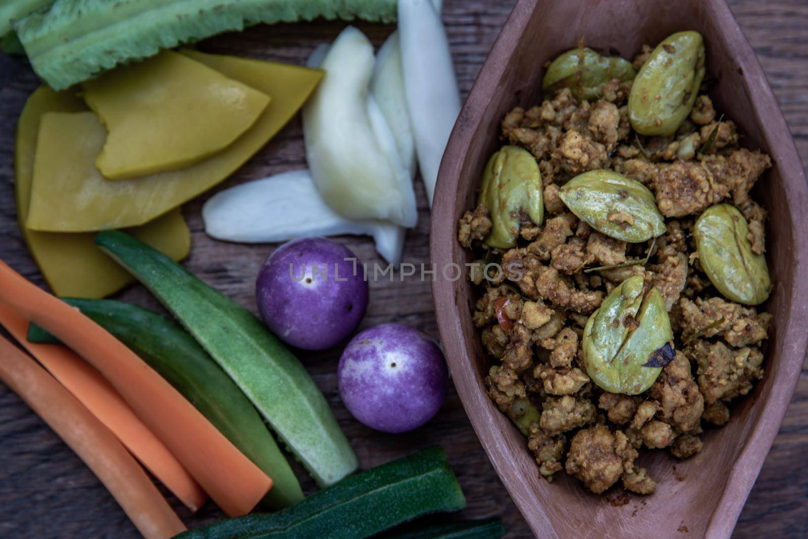 Thai food,  Southern Thai dry curry with ground pork Khua Kling, Thai dry curry with ground pork with Herbs vegetables, view from above.