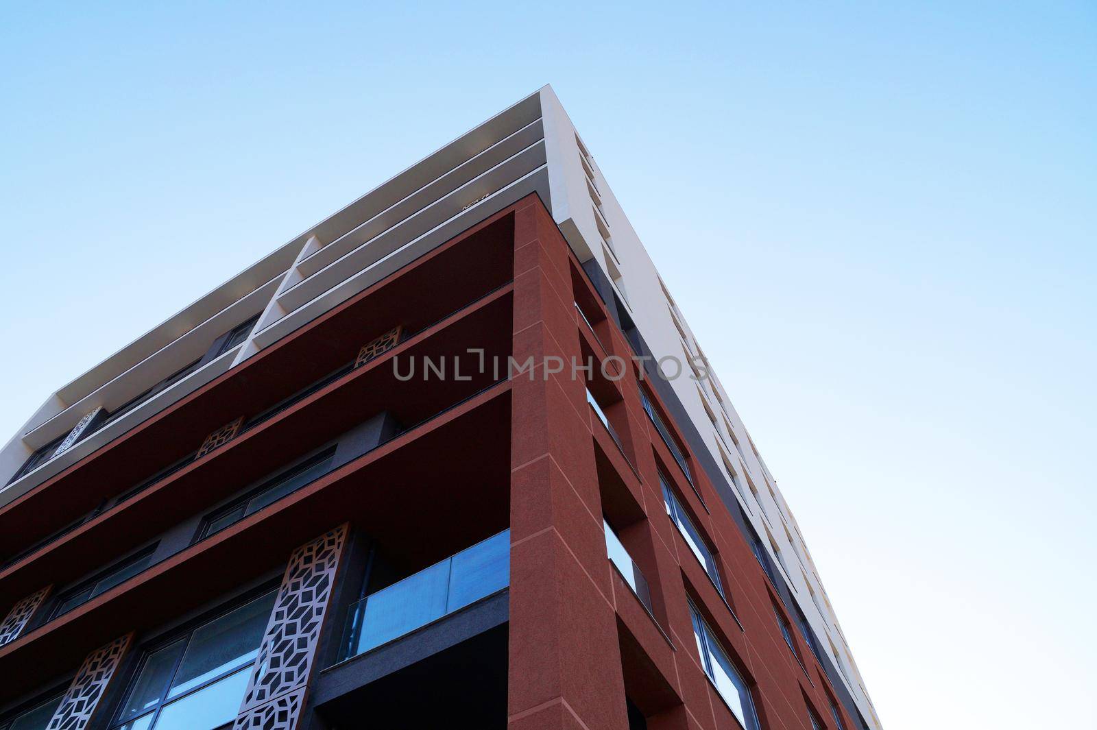 modern futuristic facade of a residential building in the park panorama complex by Annado