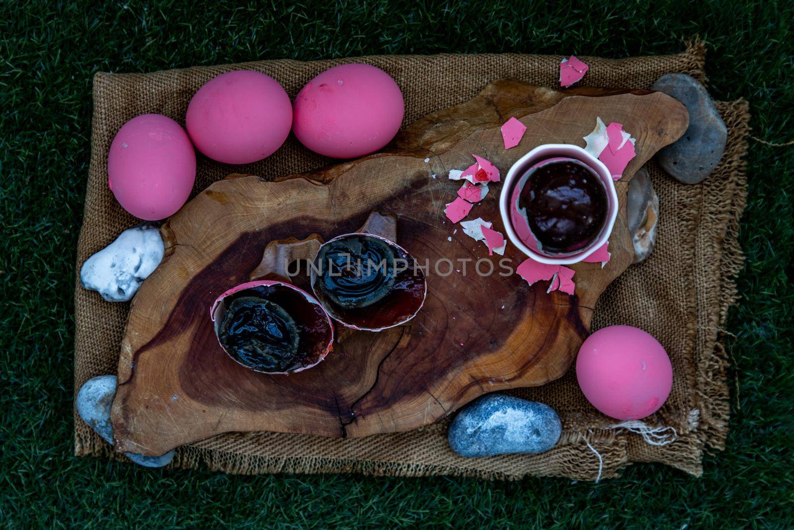 Asian Traditional Food, Pink Century eggs (Pidan Eggs) also known as preserved egg, hundred-year egg, thousand-year egg are a Chinese preserved food product and delicacy made by preserving duck, chicken in A Mixture of Ash, Salt, Red Lime, Sodium Carbonate, Tea Leaves and Zinc Oxide, Selective focus.
