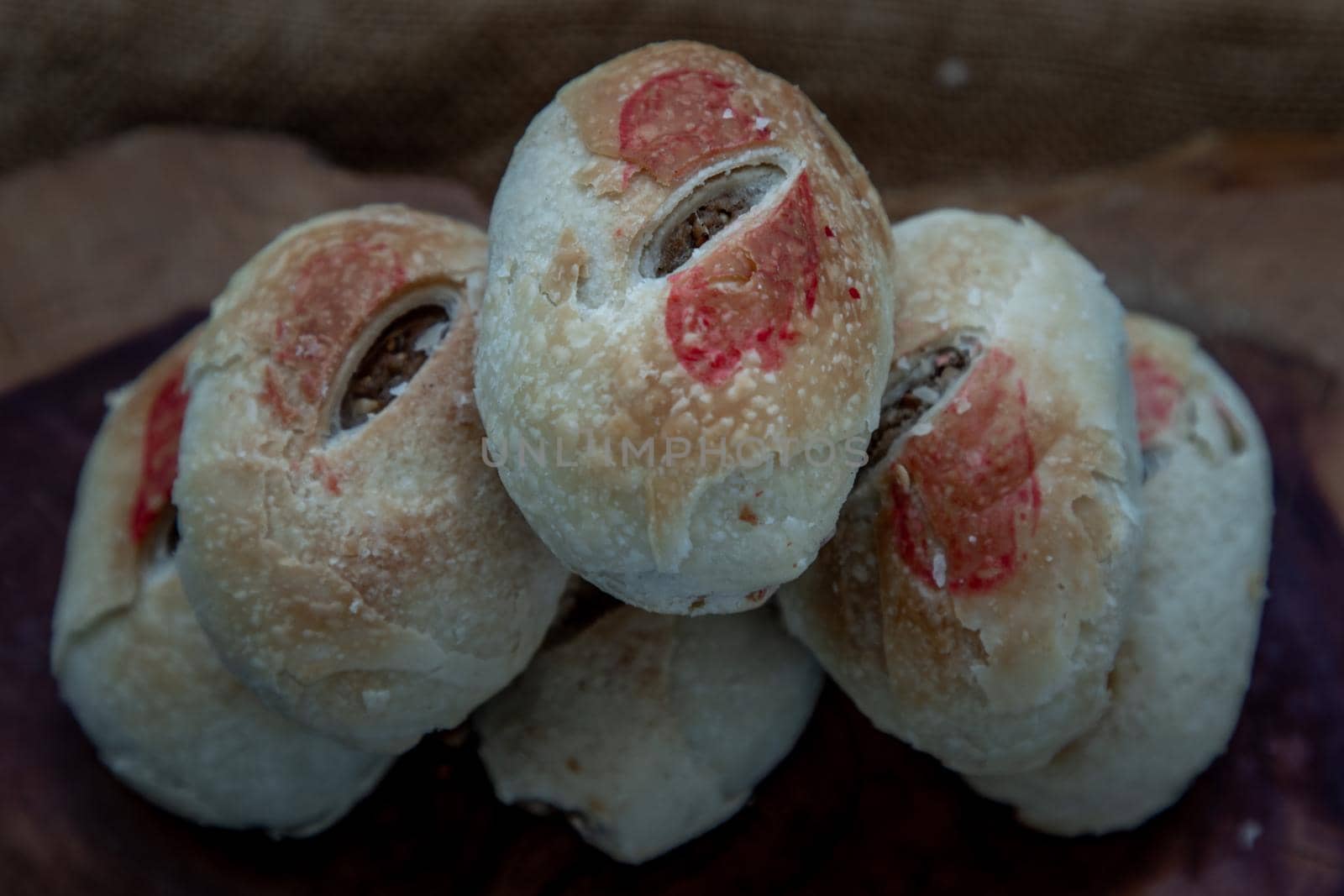 Close-up of Chinese Pastry (Happiness pastry) on wooden. This type of traditional chinese pastry is typically shared with friends and relatives during happy occasions, especially wedding ceremonies.