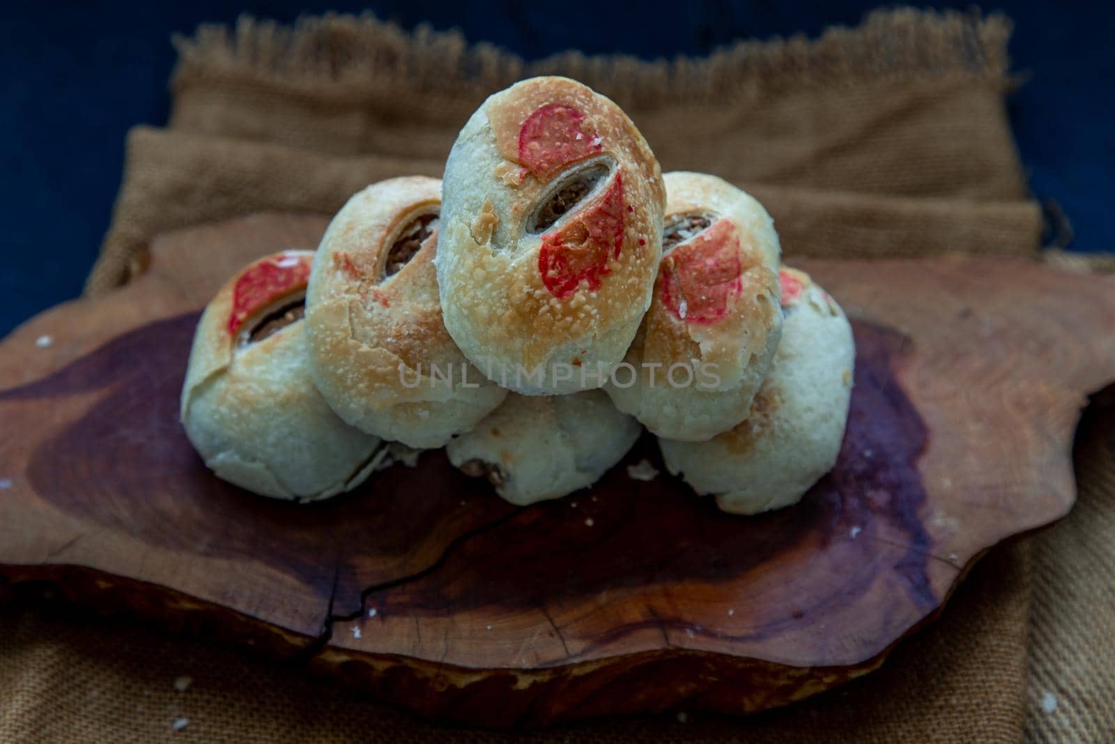 Chinese Pastry (Happiness pastry) on wooden. This type of traditional chinese pastry is typically shared with friends and relatives during happy occasions, especially wedding ceremonies, Oblique view from the top.