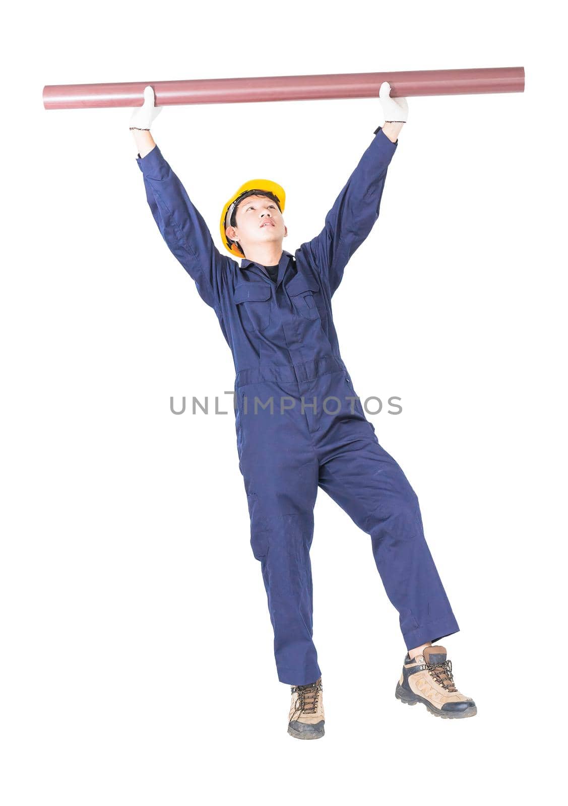 Young plumber in uniform holding pvc pipe isolated on white background