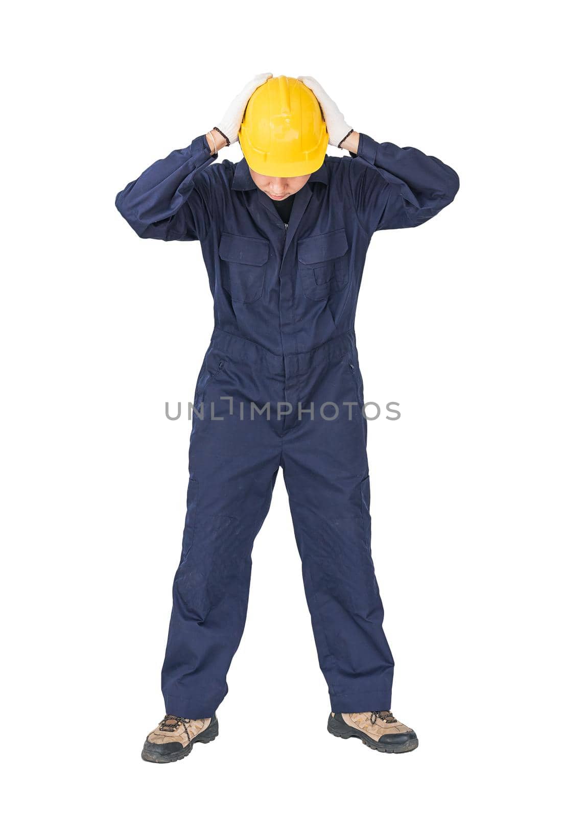 Workman with blue coveralls and hardhat in a uniform with clipping path by stoonn