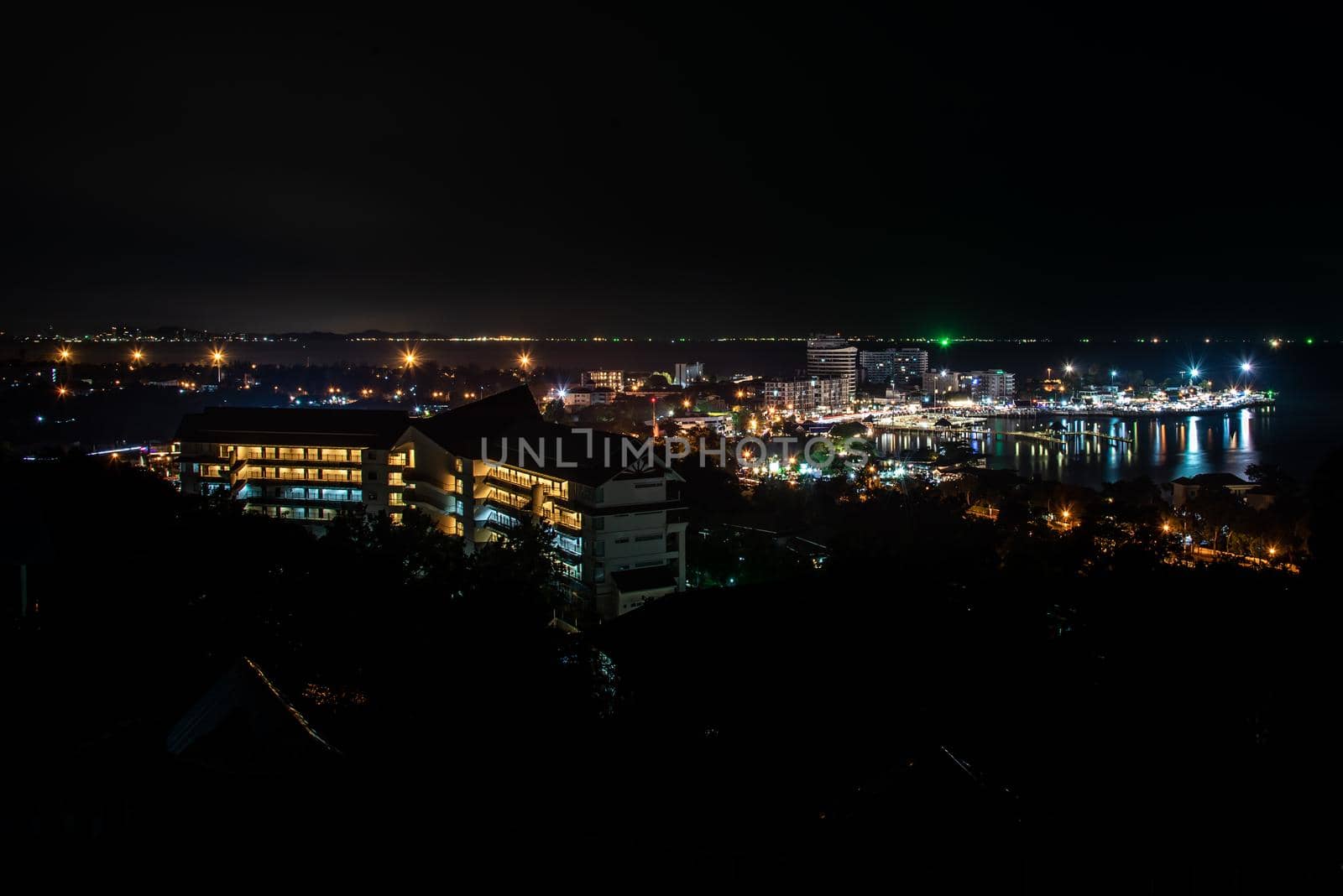 Chonburi, thailand - Oct 05, 2019 : Laem Thaen with top view on Khao Sam Muk Mountain at night view of chonburi, Beautiful Khao Sam Muk view point twilight.