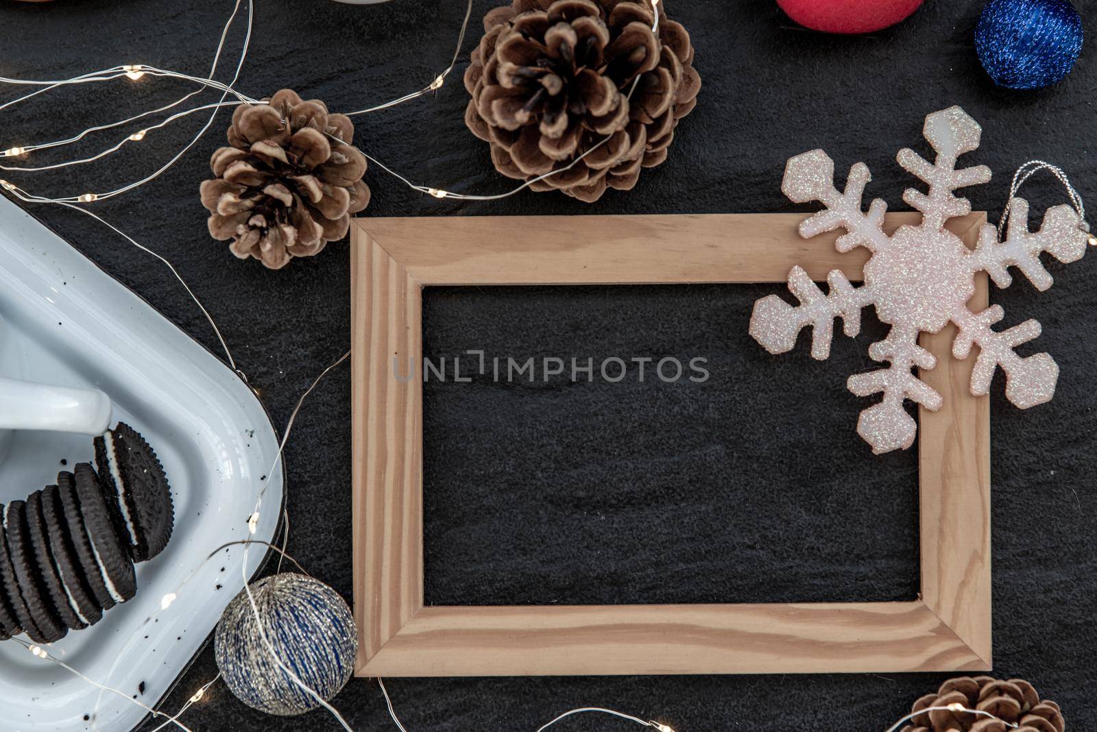 Christmas decoration with Empty wooden frame for work about design element.  Selective focus, Top view, copy space