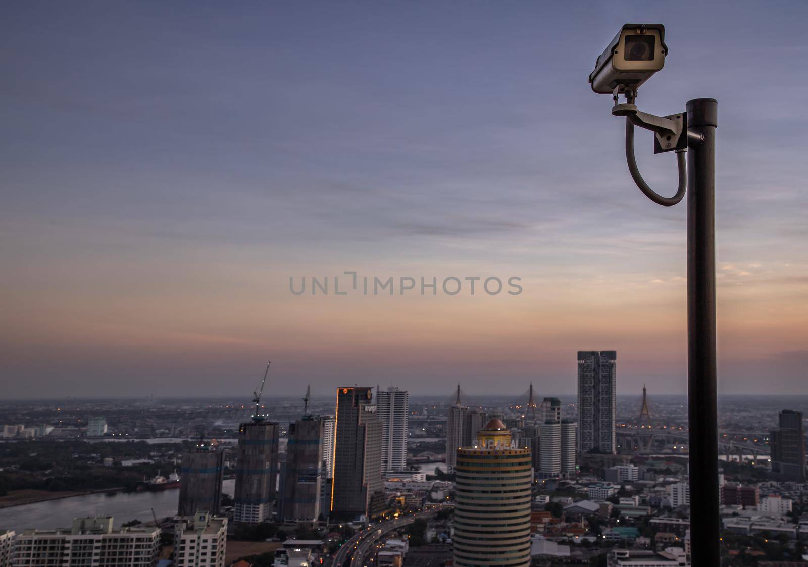 Bangkok, thailand - Mar 06, 2020 : Modern surveillance cameras on the cityscape background wall, the concept of surveillance and visual inspection that has been developed. Selective focus.