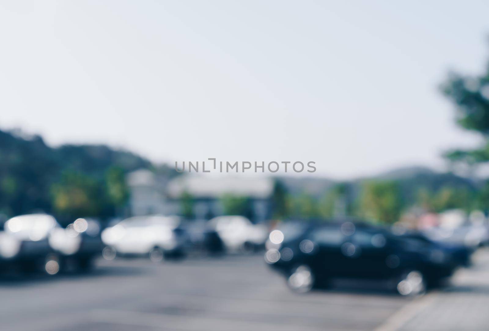 Blur car park with many cars abstract background. Vintage tone color.