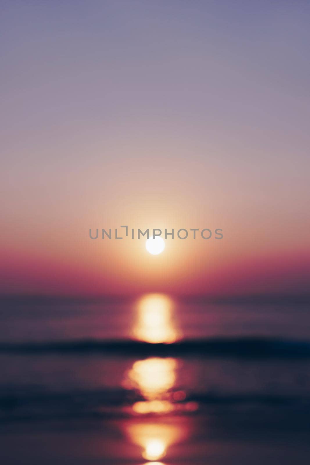 Blur tropical nature clean beach sunset sky time with sun light smartphone wallpaper background.