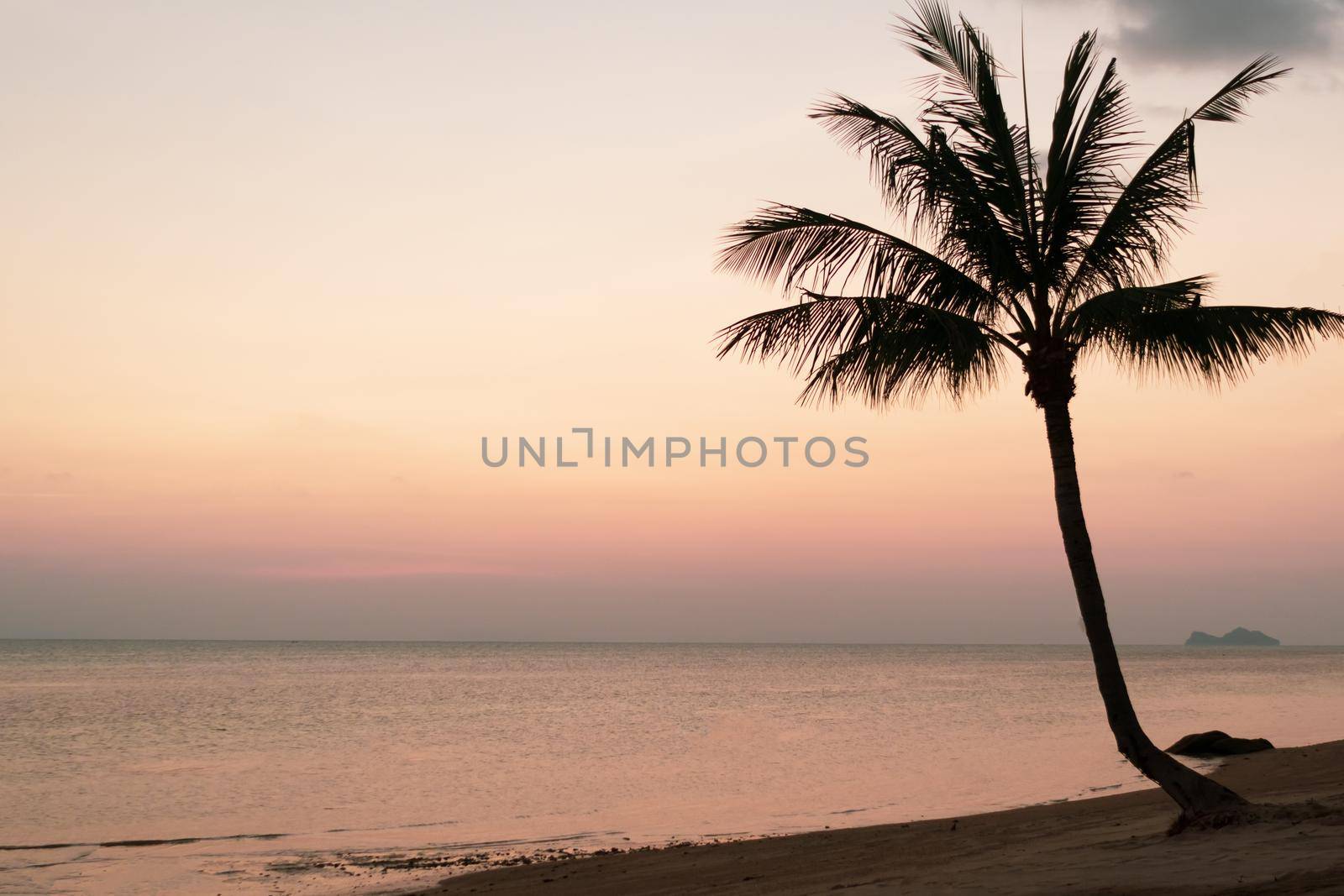 Tropical nature clean beach and white sand in summer season with sun light blue sky background.