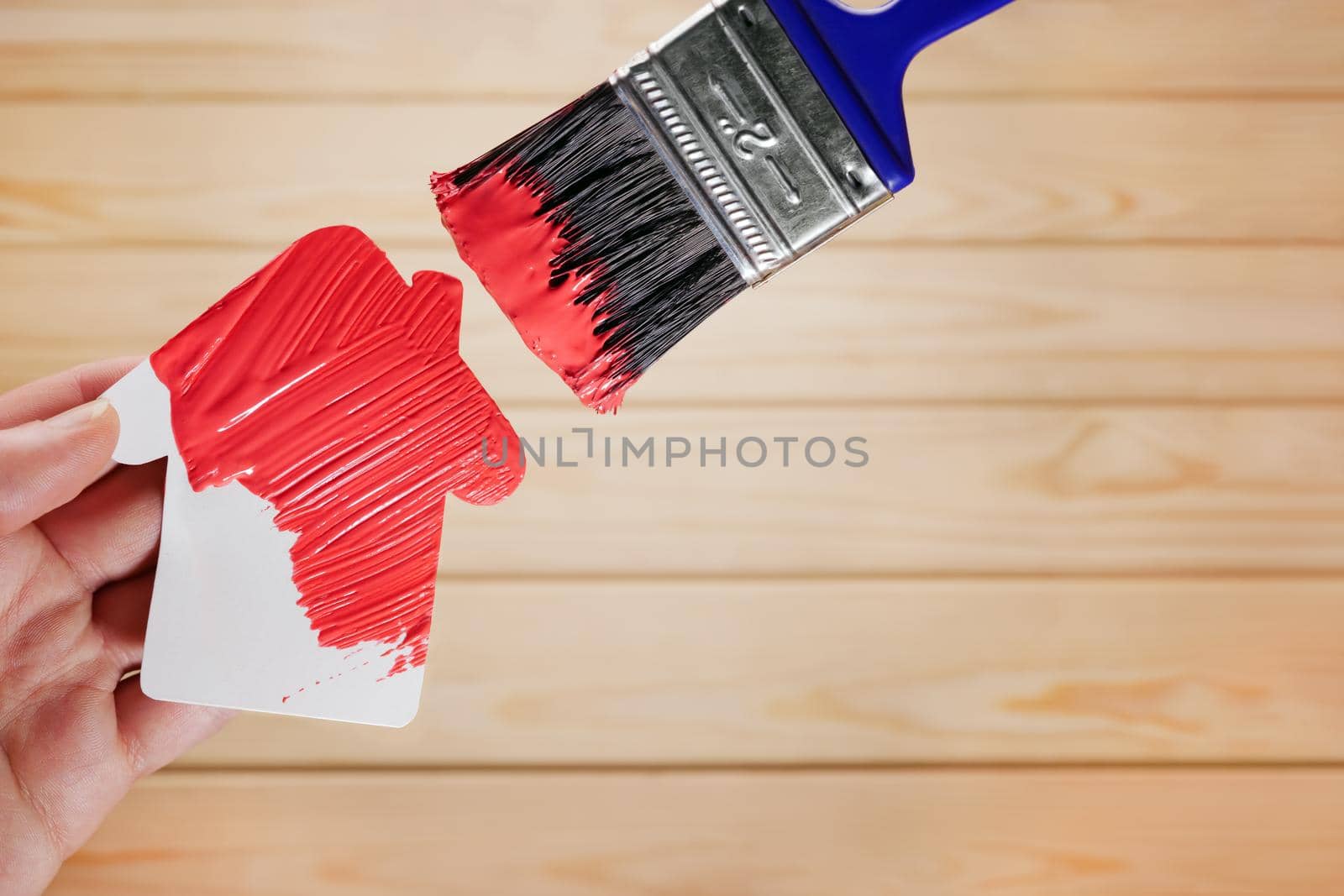 Symbol house painting brush in red color. New house remodeling renovation paint renew home. Painting work house icon renovation home construction model. Repair house decoration paint home improvement