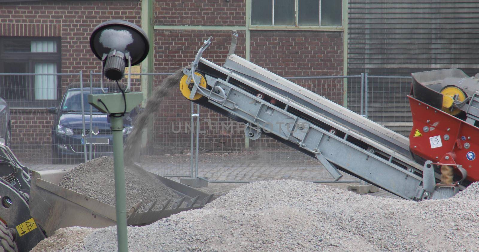 Conveyor belt brings stones to the crusher for crushing