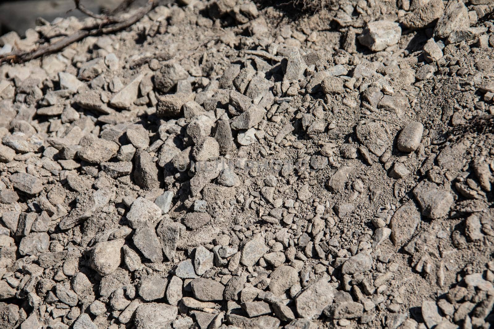 Pile of gravel at the roadside for road construction