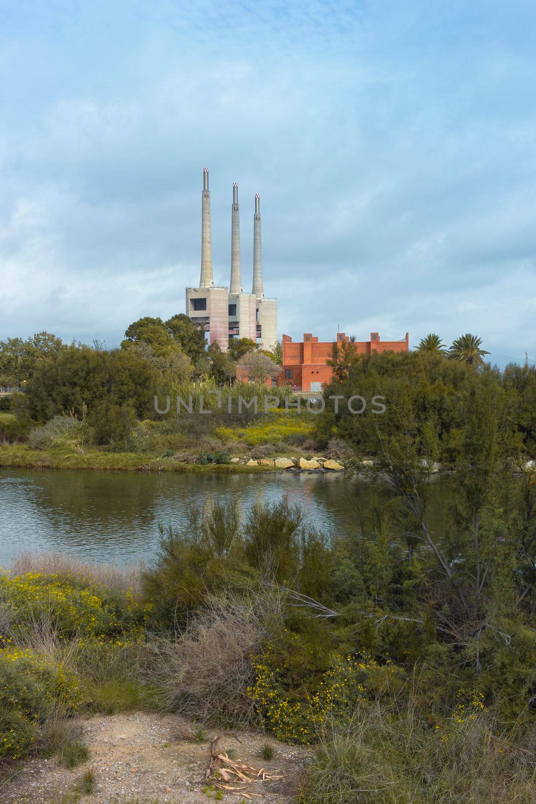 Landscape with an old disused thermal power station for the production of electric energy by loopneo