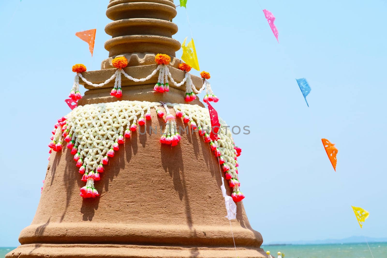 flowers on sand pagoda was carefully built, and beautifully decorated in Songkran festival by Darkfox