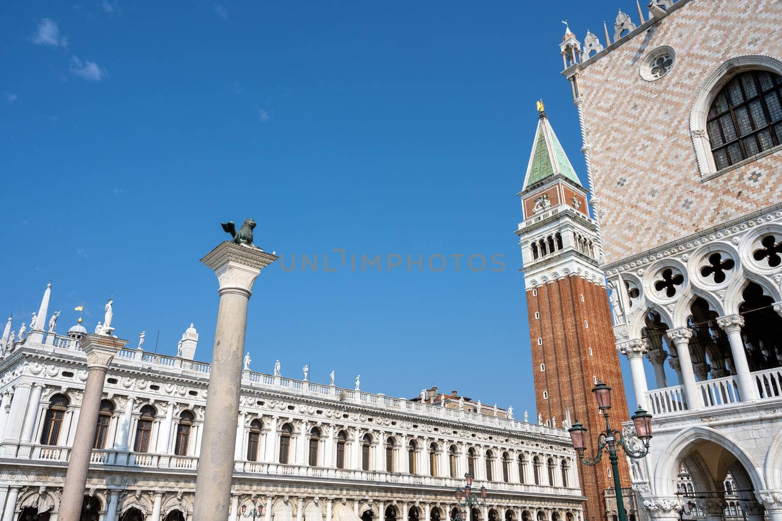 Part of the famous Doges Palace with the Campanile and the Marciana Library by elxeneize