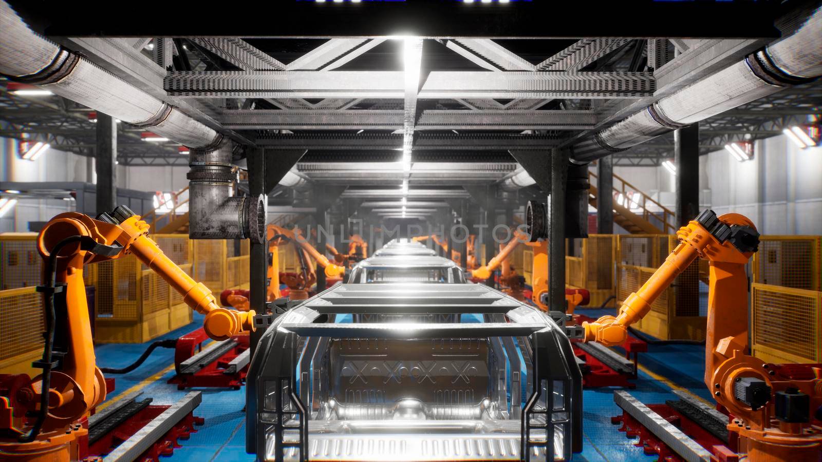 Car welding line of conveyor with frameworks of unfinished cars and robots welders.