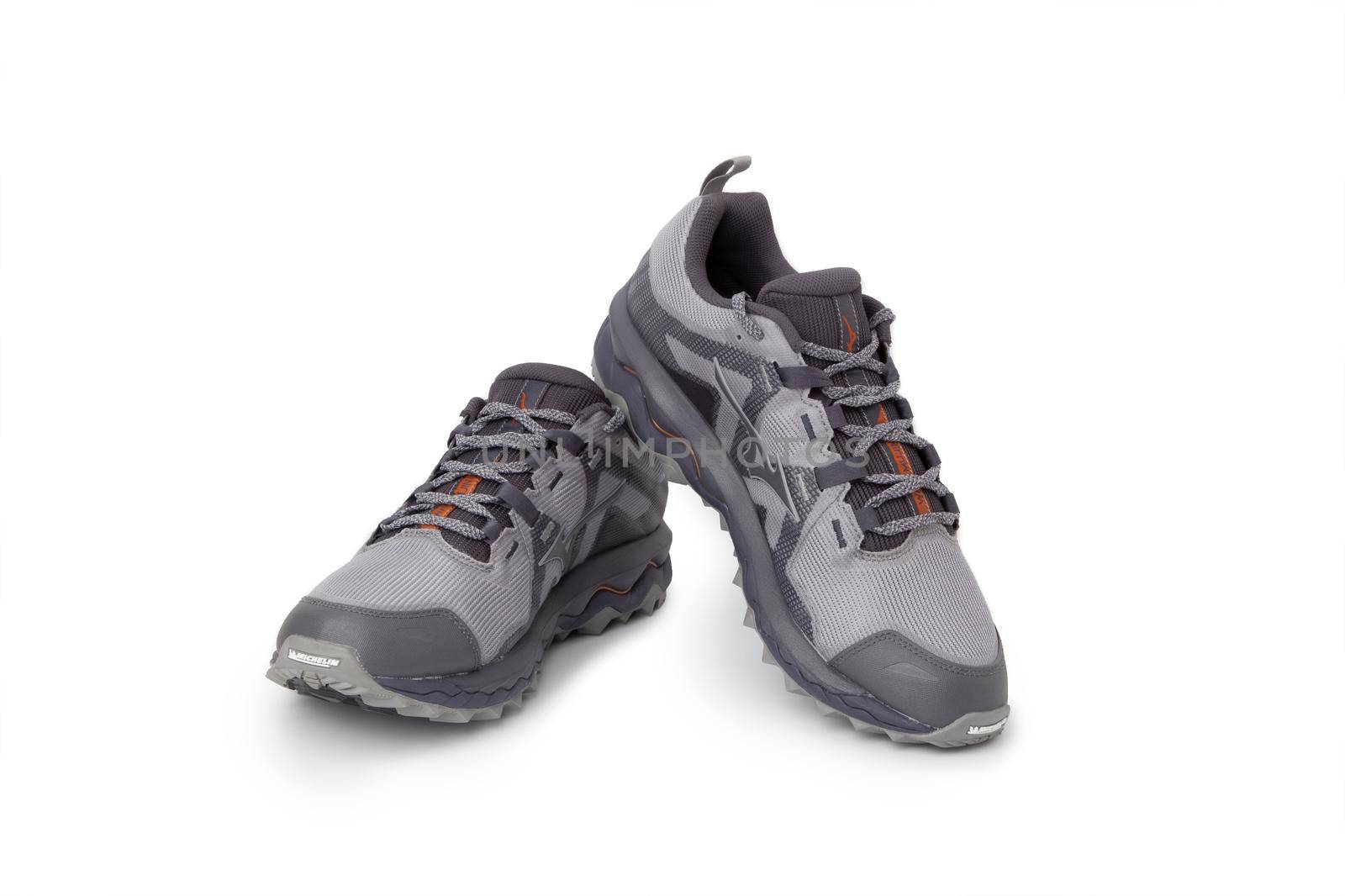 Mizuno Wave Mujin 6 Trail running sneakers close up isolated on a white background by SlayCer