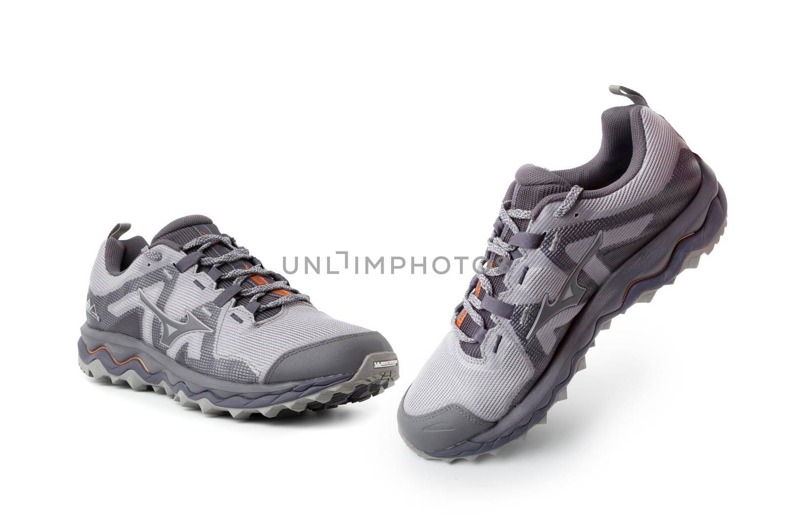 Mizuno Wave Mujin 6 Trail running sneakers close up isolated on a white background by SlayCer