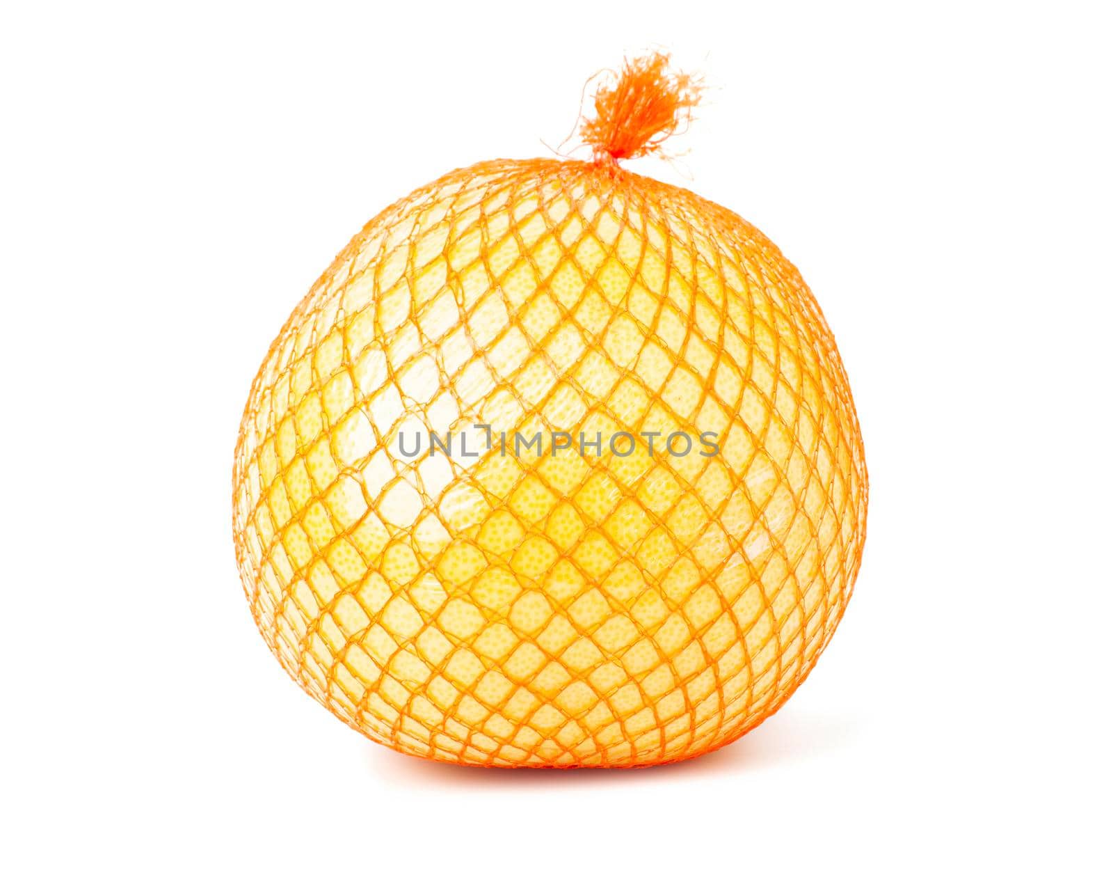Pomelo citrus fruit in a shipping orange package close up isolated on a white background