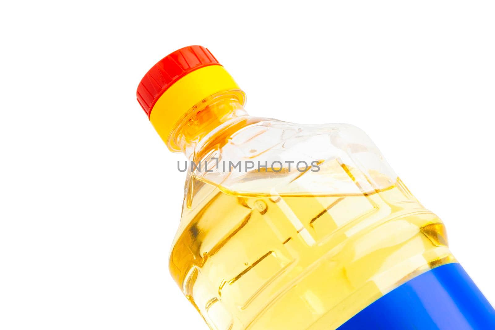 Oil in plastic bottle isolated on white background. With clipping path