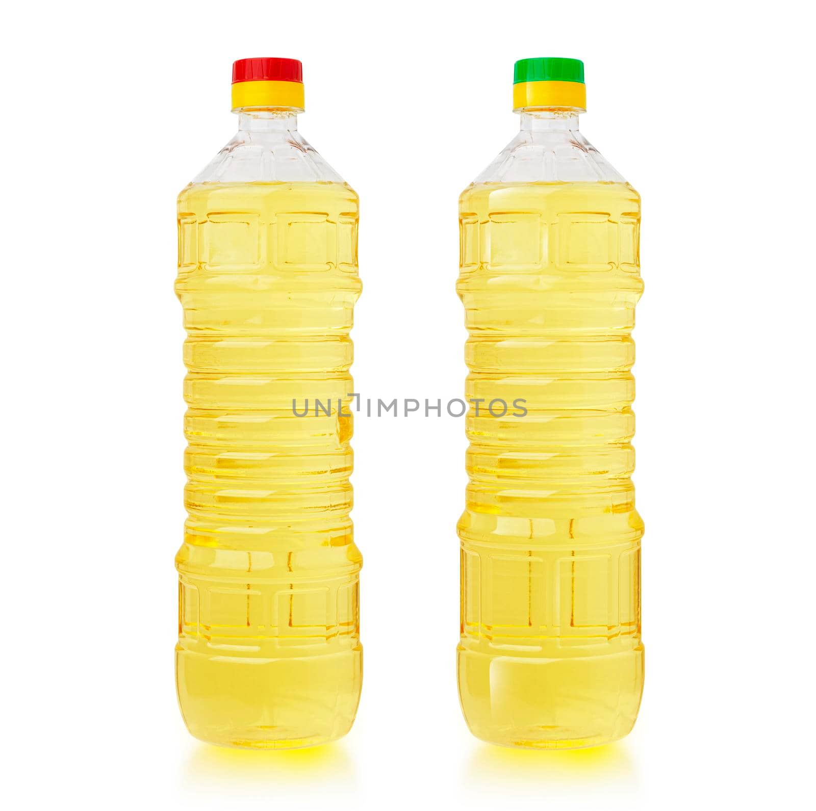 Oil in plastic bottles. Two bottles isolated on white background. by SlayCer