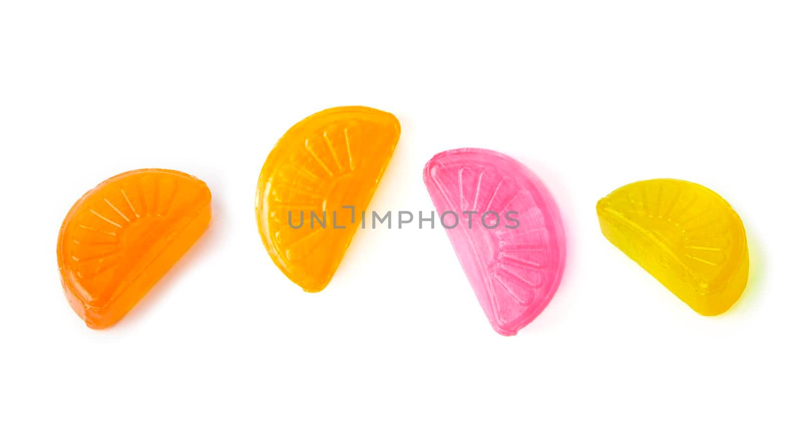 colorful fruit hard candy isolated on white by SlayCer
