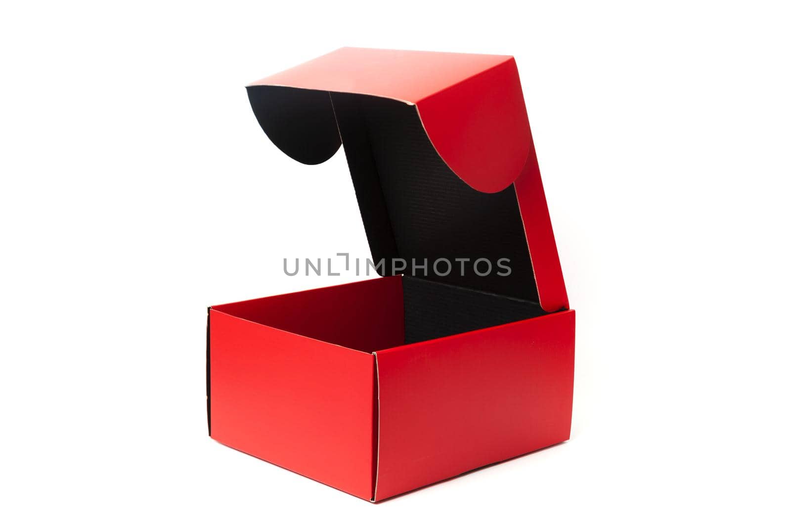 Opened Red cardboard gift box. packaging for shopping and gifts isolated on white background