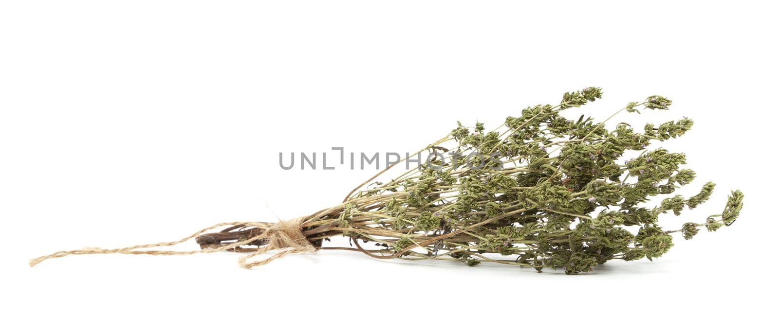 Dry thyme pile and plants with stalks isolated on white background