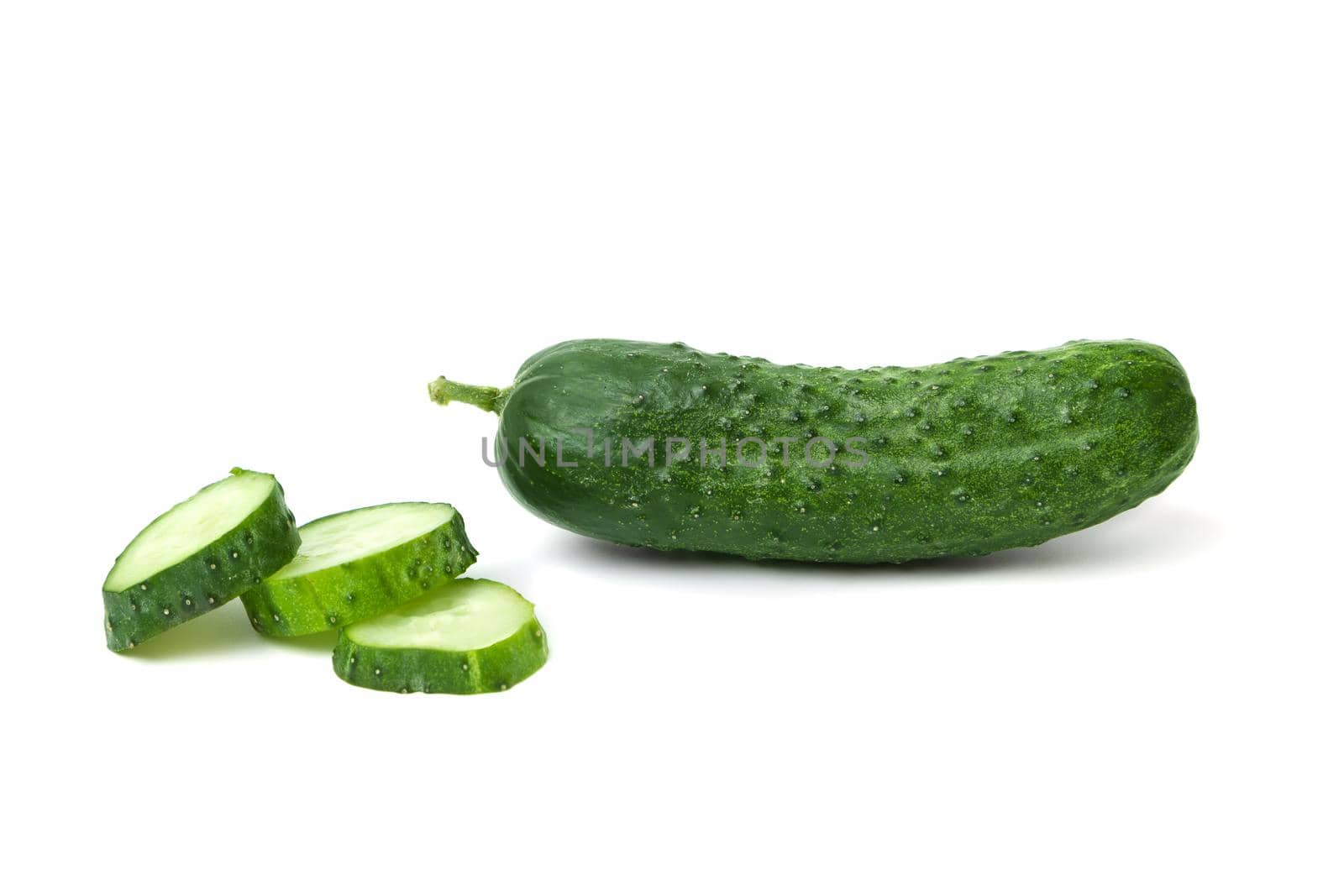 Fresh cucumber, chopped cucumber, isolated on white. background by SlayCer