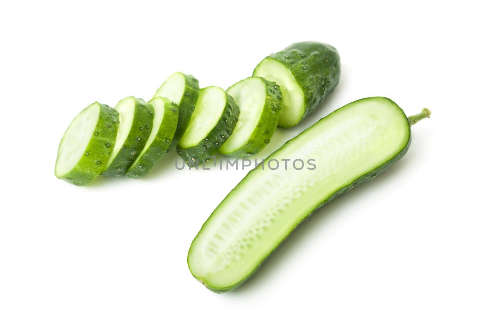Fresh cucumber, chopped cucumber, isolated on white. by SlayCer