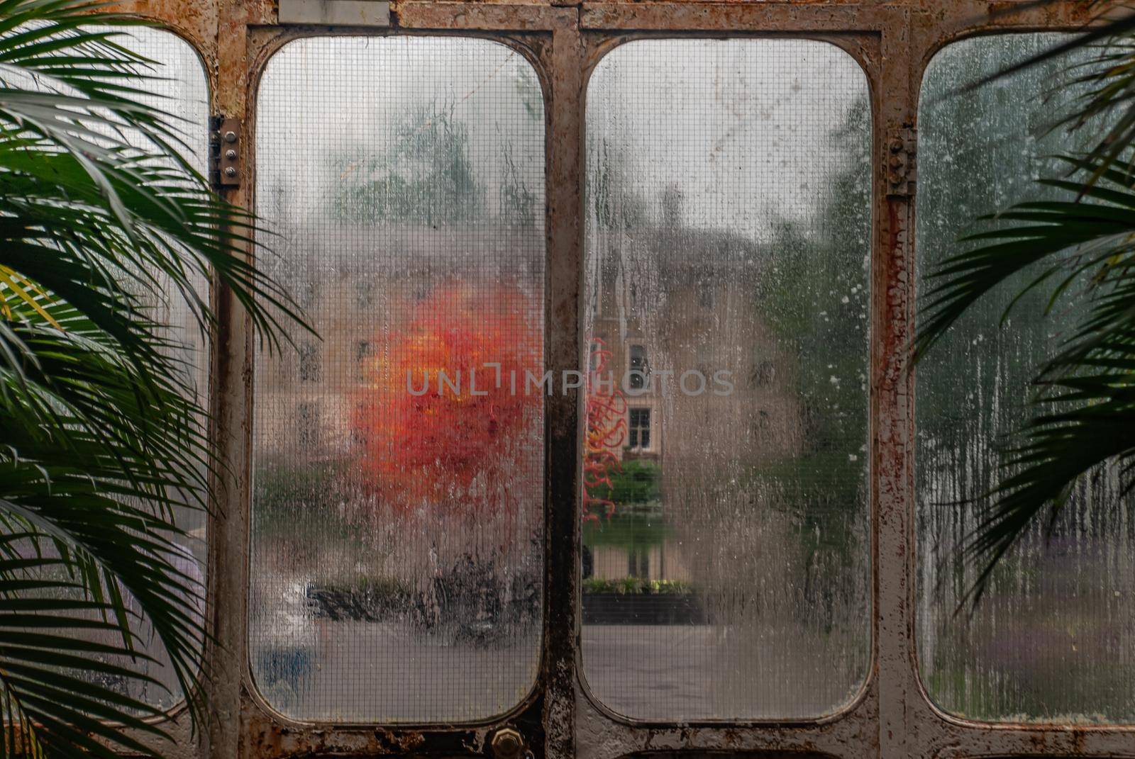 London, UK - Apr 9, 2019 : Beautiful exit door of Palm House at Kew Gardens (Royal Botanic Gardens).