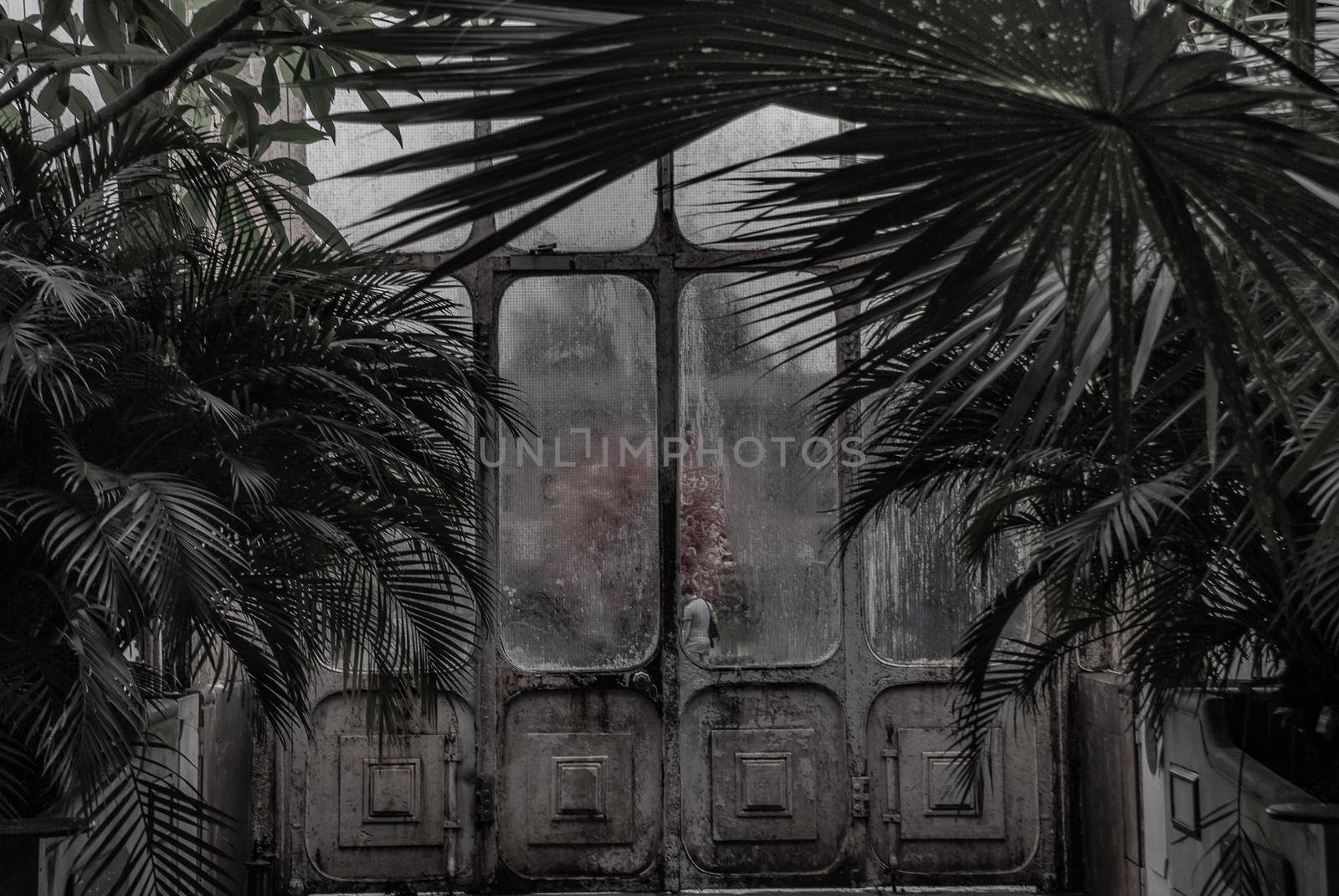 London, UK - Apr 9, 2019 : Beautiful exit door of Palm House at Kew Gardens (Royal Botanic Gardens).