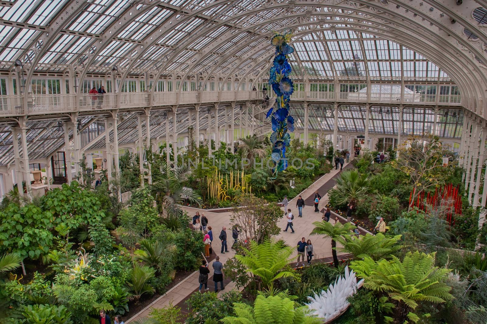 London, UK - Apr 9, 2019 : Palm trees in Palm house (greenhouse) at Kew Royal Botanic Gardens, Richmond.