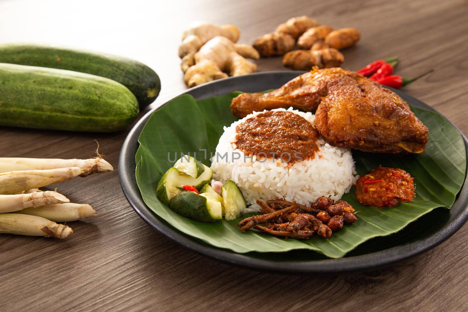 Nasi Kukus is usually comprising freshly steamed rice and crispy fried chicken by tehcheesiong