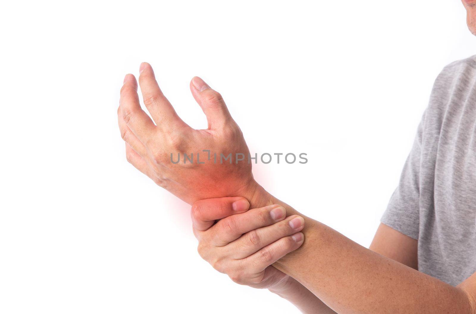 Sore pain of hand. Sprain and arthritis symptoms. middle age man holding his hurt hand over white background.
