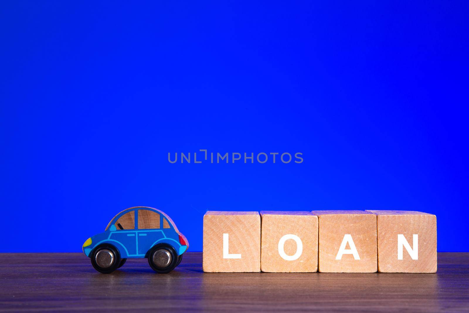 Car loan or vehicle rental concept with blue background. by tehcheesiong