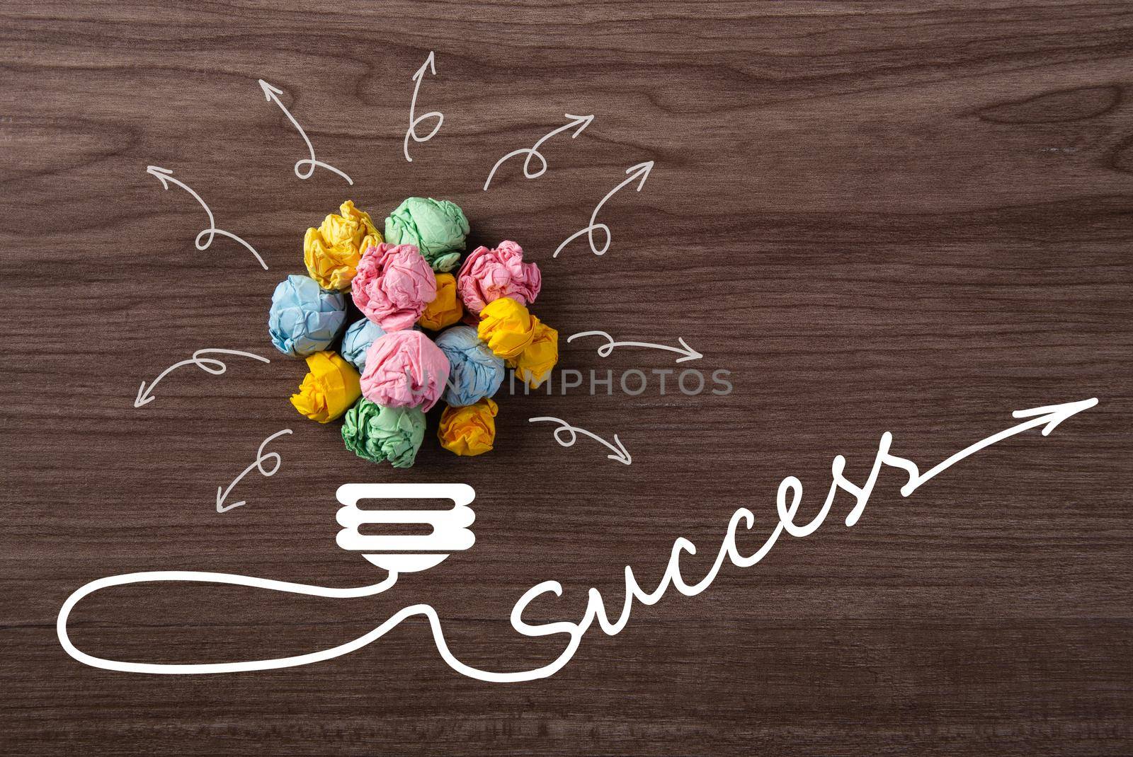 New good ideas, Paper Ball of lightbulb shape with success word on wooden background