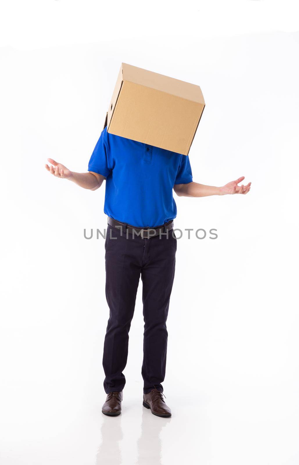 man in a blue T-shirt with a cardboard box on his head makes a gesture with his hands by tehcheesiong