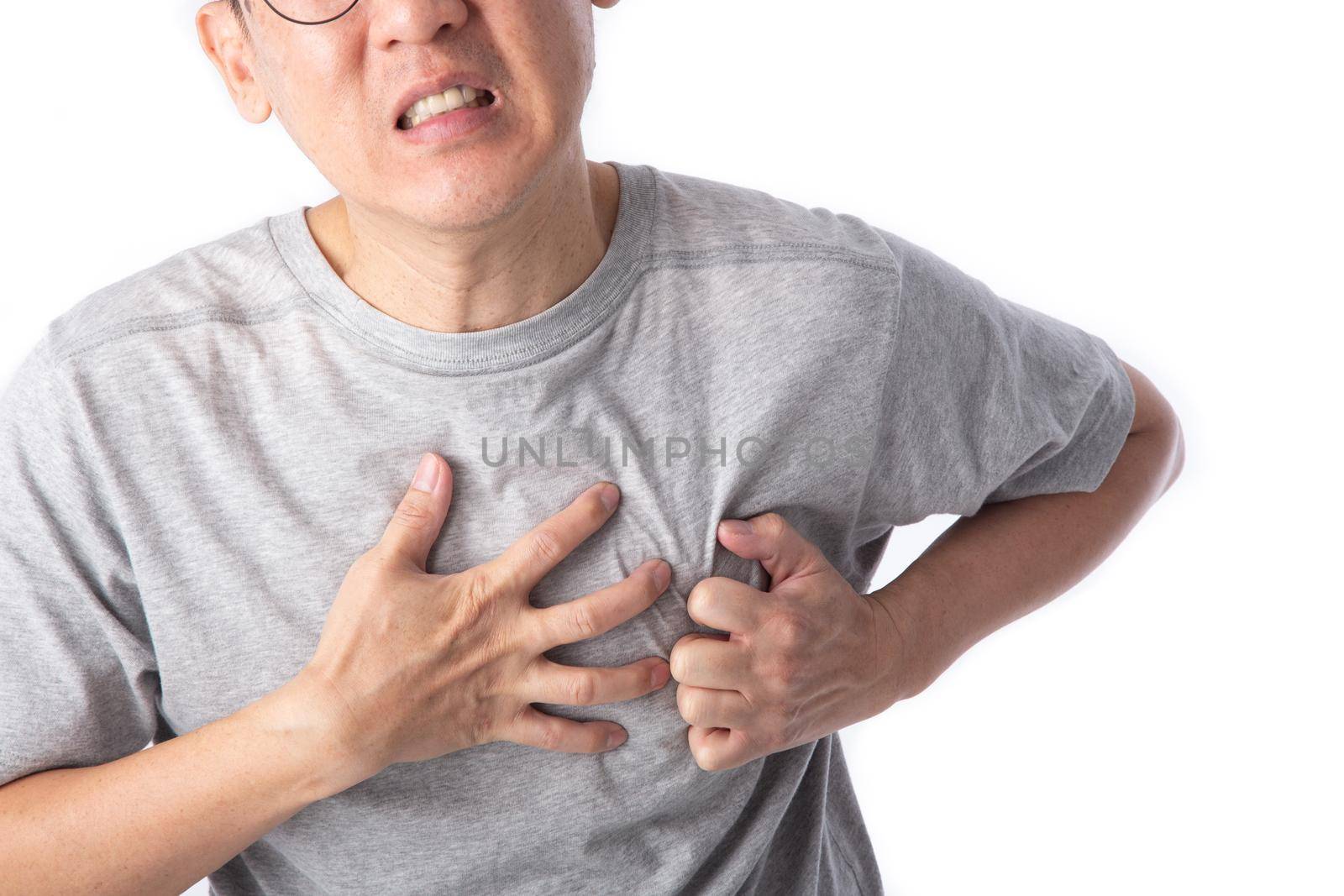 middle age man has a heart attack symptom. Senior health or health care concept.