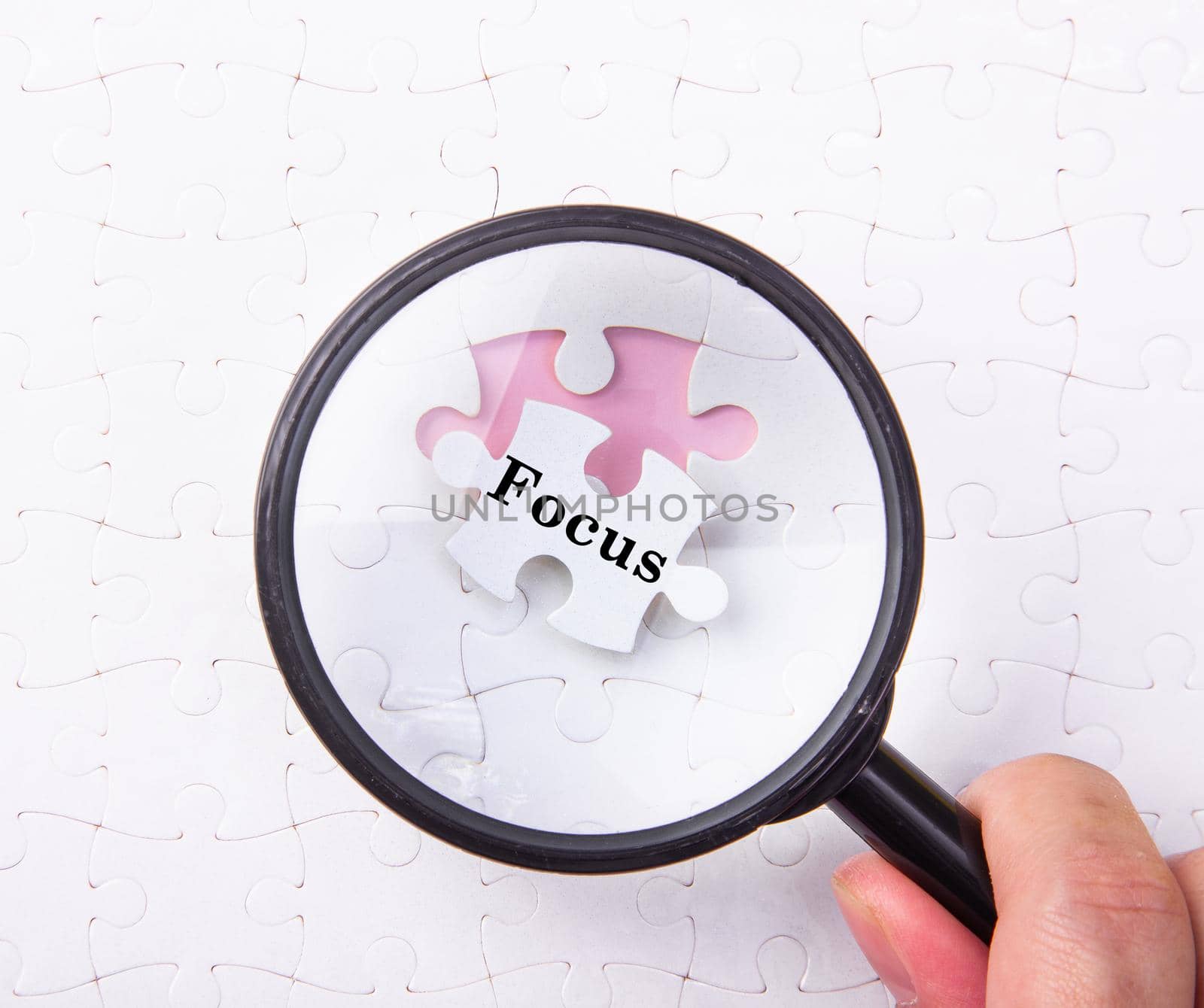 Set of puzzle pieces with word of Focus background.  by tehcheesiong