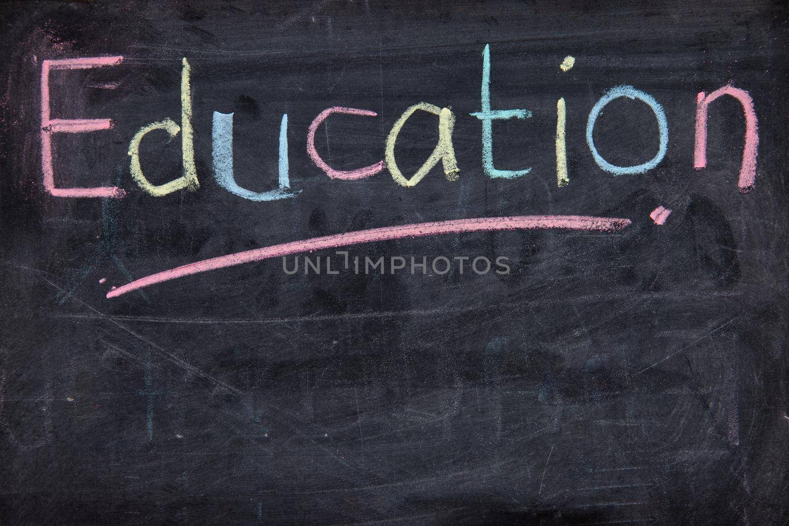 The word Education written on blackboard. by tehcheesiong