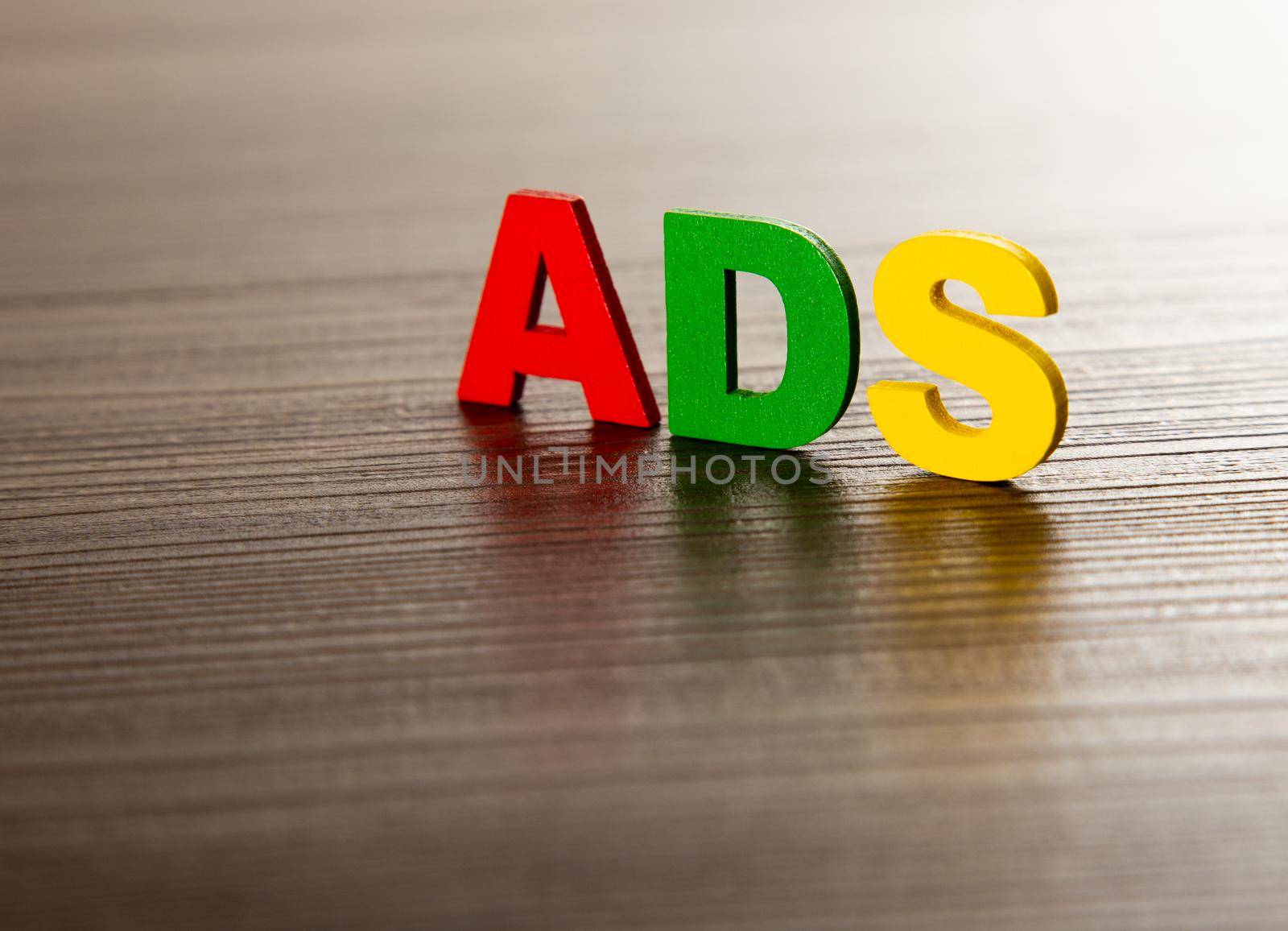 word ADS on wooden table, business concept. business and Finance