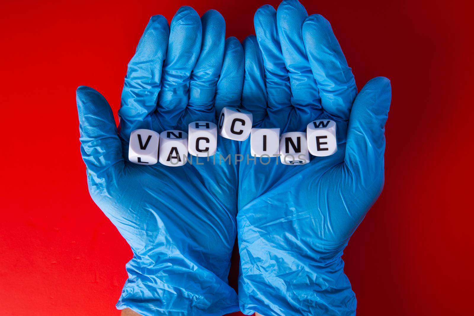 Doctor hand  with words 'vaccine'. Medical covid-19 concept