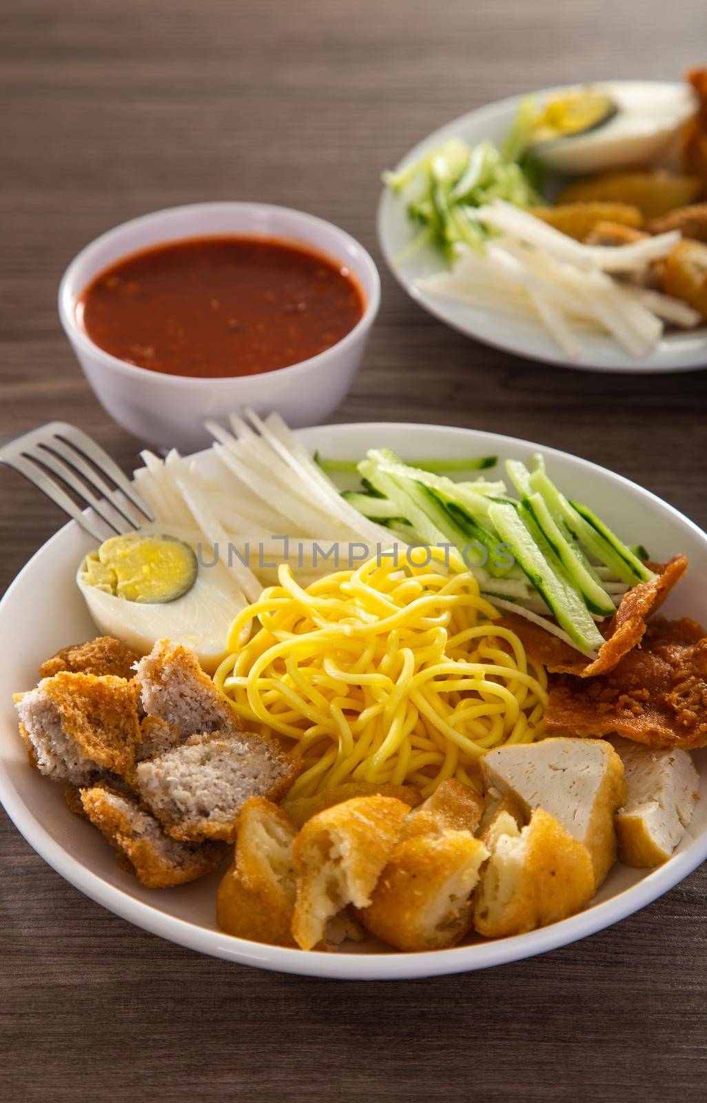 Mee Rojak is Malaysia Indian food of noodle with peanut sauce. One of very famous food in asia.
