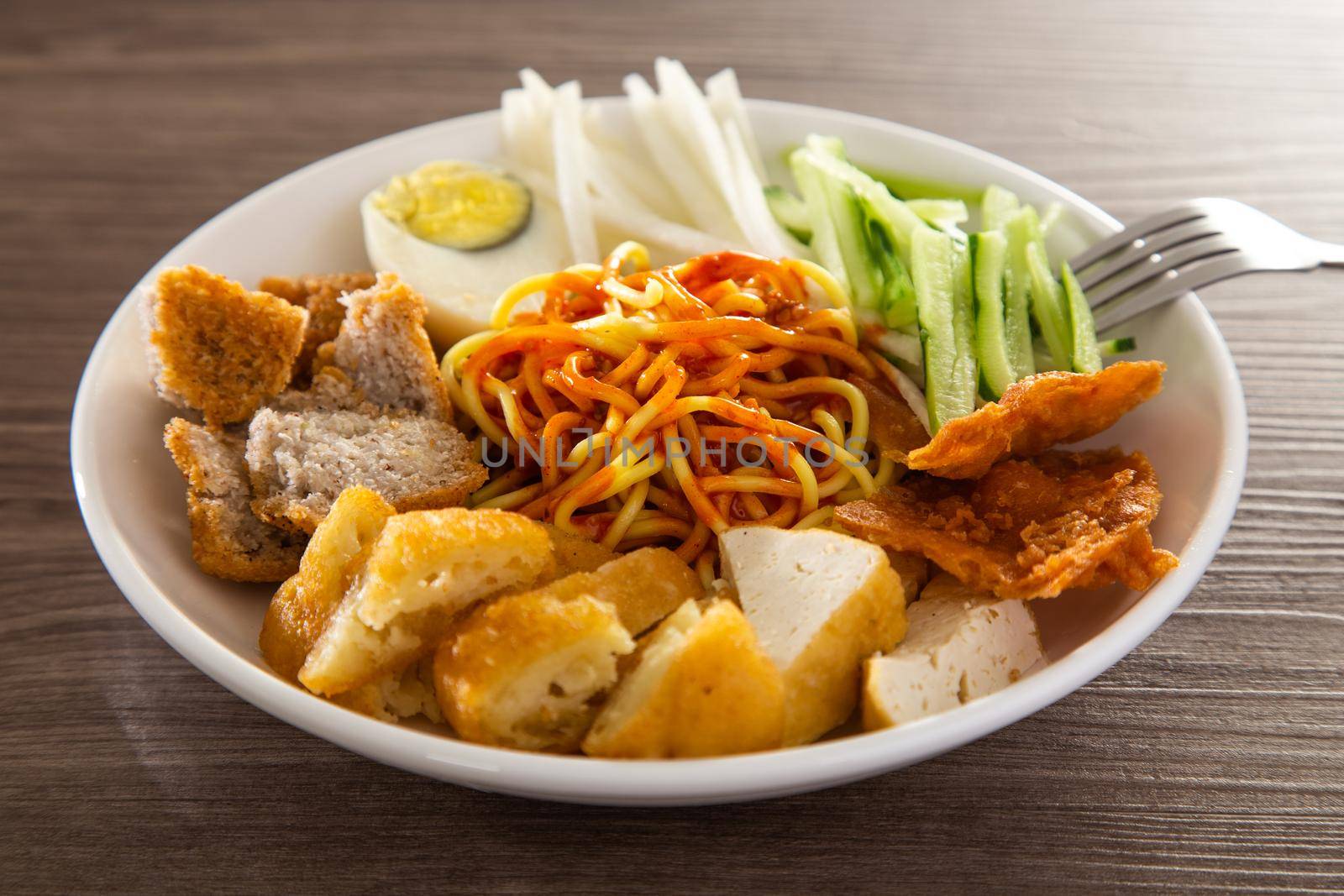 Mee Rojak is Malaysia Indian food of noodle with peanut sauce. One of very famous food in asia.