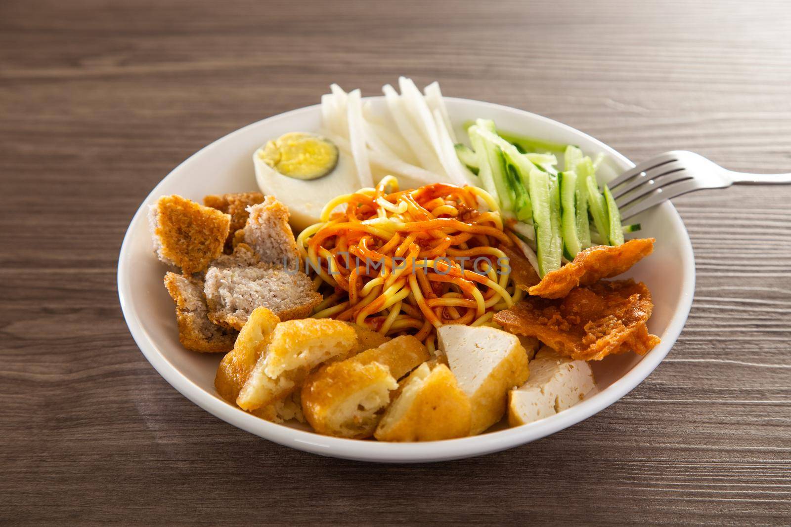 Mee Rojak is Malaysia Indian food of noodle with peanut sauce. One of very famous food in asia.