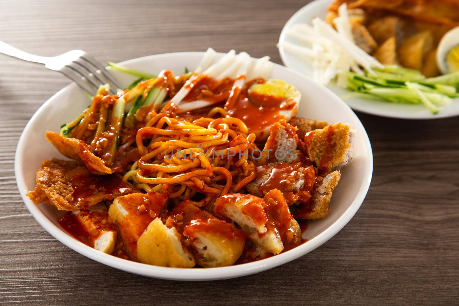 Mee Rojak is Malaysia Indian food of noodle with peanut sauce. One of very famous food in asia.
